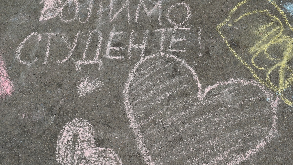 We love students, written in chalk